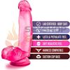 Dildo rosa semi transparente con testiculos y sopapa